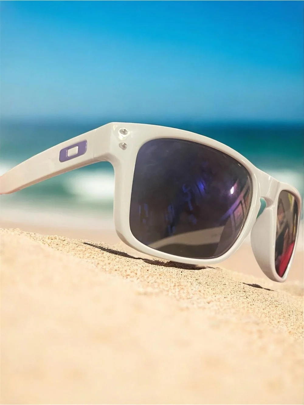 White Oakley Sunglasses with  Purple logo and Lenses.